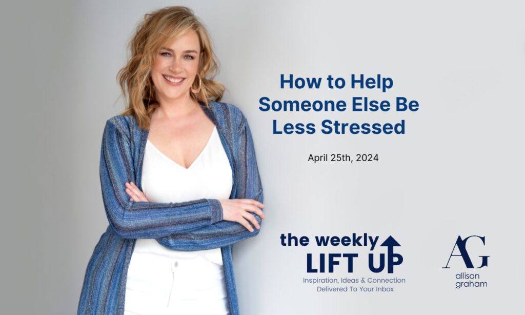 How to help someone else be less stressed in navy writing with Allison Graham leaning against a wall wearing white jeans and a white shirt and her arms crossed