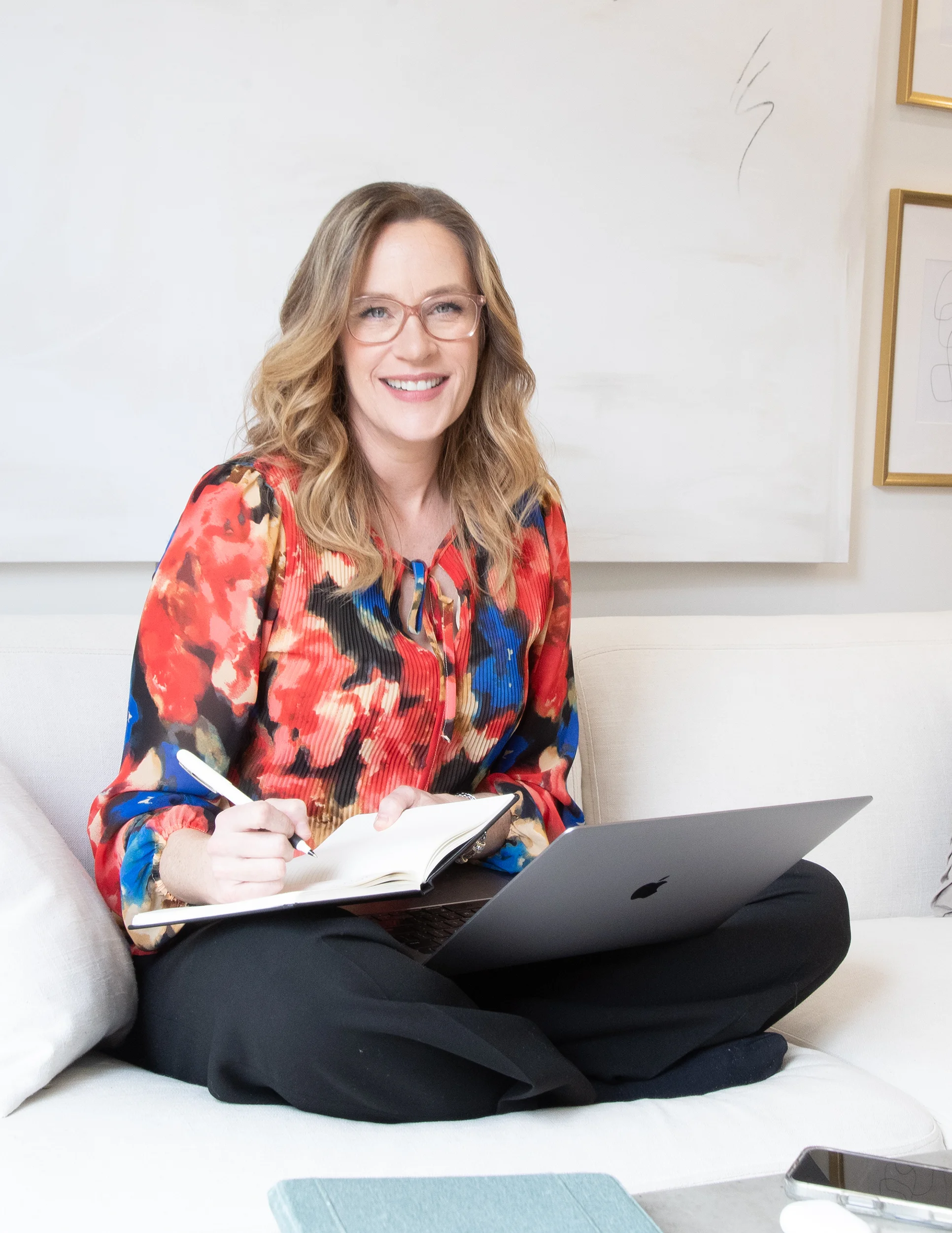 Allison Graham working at laptop